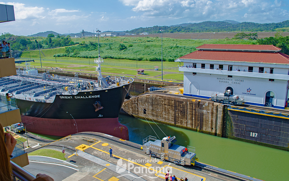 Ship is helped by the locomotives to enter the 2nd chamber of the Miraflores locks. 
